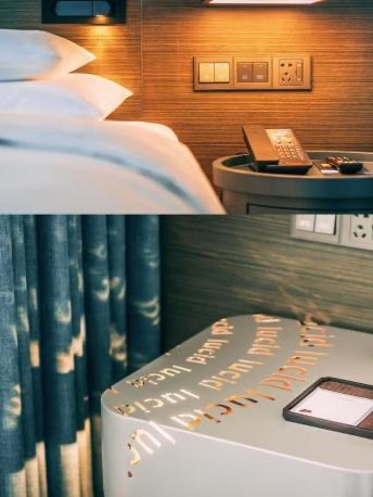A warm, quiet single room — bed and bedside table — for recovery